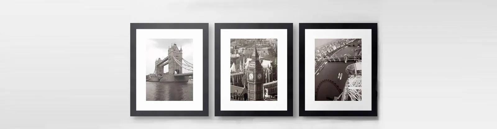Quadros emoldurados pela Vitrais Celso expostos em parede